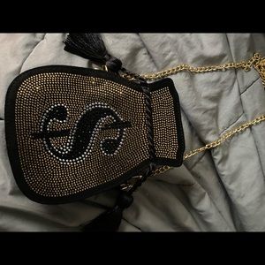 Skinny dip $ bag. Bought on ASOS